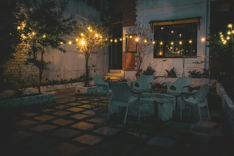 Landscape lighting illuminating a pathway at night